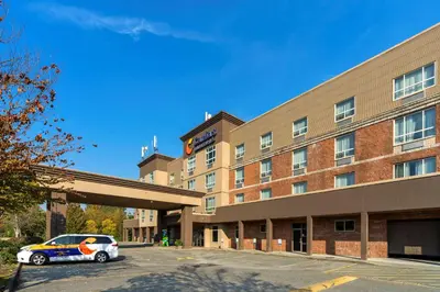 a car parked in front of a hotel at Comfort Inn & Suites in Surrey