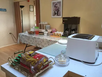 a kitchen with a counter with a toaster on a table at Evergreen Motel in Princeton