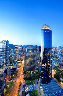 a view of a city with a tall building at Sheraton Vancouver Wall Centre in Vancouver