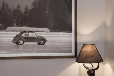 a picture of a car with a surfboard on top at Gibbons Life Accommodations in Whistler