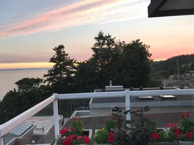 a view from the balcony of a house with flowers at Donna's Bed & Breakfast in White Rock