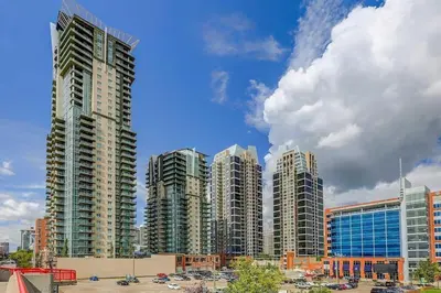 a group of tall buildings in a city at Monki Di Executive Suites - Alura in Calgary