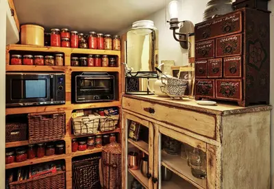 a kitchen with a counter with a microwave and a stove at A Suite Retreat - Beyond Bed & Breakfast in Sun Peaks