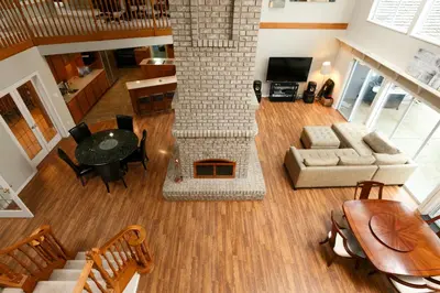 an aerial view of a living room with a fireplace at Muchen Villa in Delta