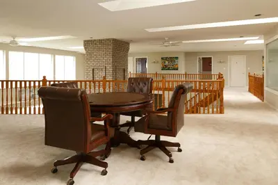 a dining room with a table and chairs at Muchen Villa in Delta