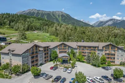 an aerial view of a resort with a parking lot at Silver Rock by StayIn in Fernie