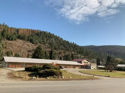 a large building on the side of a mountain at Green View Motel and RV Park in Greenwood