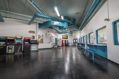 an empty room with machines in a building at Argyll Plaza Hotel in Edmonton