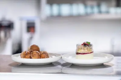 two plates of food on top of a table at River Cree Resort & Casino in Edmonton