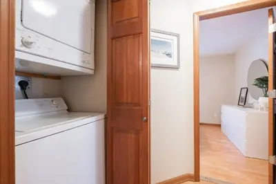 a kitchen with a microwave and a dishwasher at Lagoons by Outpost Whistler in Whistler