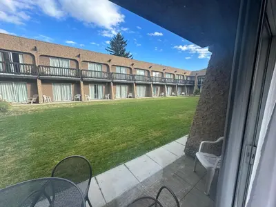 a view from the balcony of a building at Divya Sutra Plaza and Conference Centre, Vernon, BC in Vernon