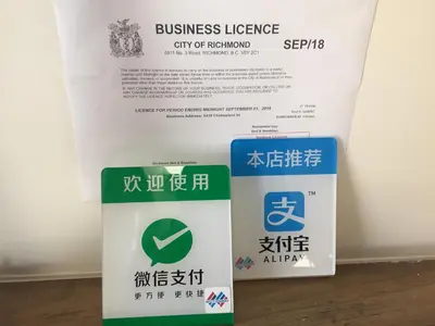 a sign for a business league city of korea at Go House in Richmond