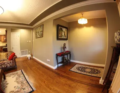 a living room with a couch and a table at Semi Centre House in White Rock