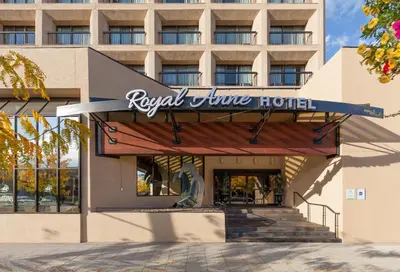 a hotel front with a sign for a hotel at The Royal Anne Hotel in Kelowna