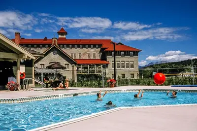 a group of people in a swimming pool at a hotel at St. Eugene Golf Resort & Casino in Cranbrook