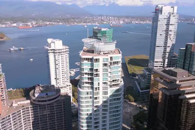 a city with tall buildings and a body of water at Vancouver Marriott Pinnacle Downtown Hotel in Vancouver