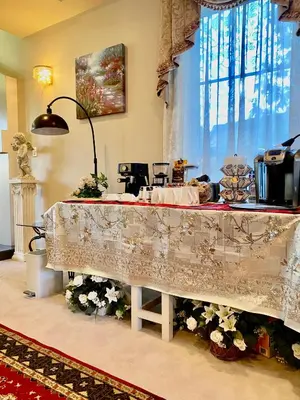 a table in a room with a table cloth on it at Jessicahouse ltd. in Richmond