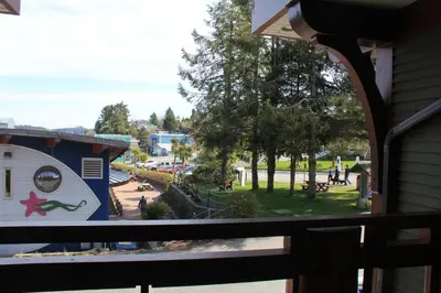 a view of a playground from a window at Beautiful Condo In A Great Location, Oceanfront Complex - Oe in Ucluelet