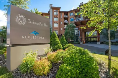 a sign in front of a building at Sutton Place Hotel Revelstoke Mountain Resort in Revelstoke