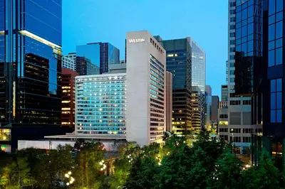 a view of a large building in a city at night at The Westin Calgary in Calgary