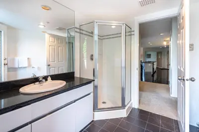 a bathroom with a sink and a shower at The Ironwood on Blueberry Hill in Whistler