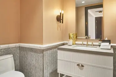 a bathroom with a sink and a toilet at the DOUGLAS, Autograph Collection in Vancouver
