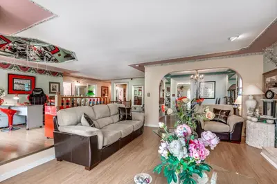 a living room with a couch and a table at Diana's Luxury Bed and Breakfast in Vancouver