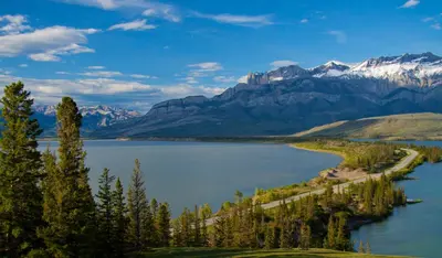 a view of a lake with mountains in the background at Overlander Mountain Lodge in Jasper