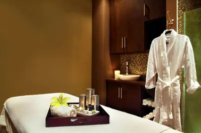 a hotel room with a bed and a sink at Four Points by Sheraton Calgary Airport in Calgary