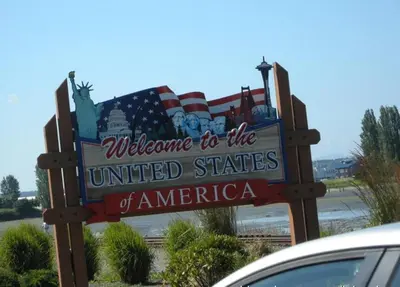 a welcome sign for the united states of america at White Rose House in White Rock