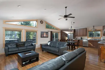 a living room with a couch and a table at Mama Bear in Valemount