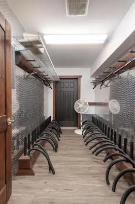 a row of chairs in a room with a door at Aspen in Valemount