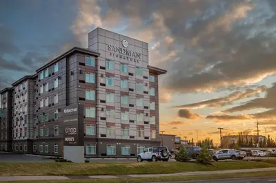 a building with a sign that reads savannah hotel at Sandman Signature Calgary Airport Hotel in Calgary