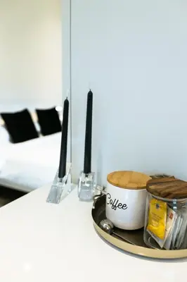 a cup of coffee on a table in a room at The Cube Cow Bay Suite in Cowichan Bay