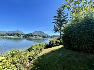 a view of a river with mountains in the background at Private Oceanfront Cabin And Hot Tub! - Gww in Ucluelet