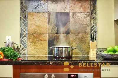 a pot on a stove in a kitchen at Bellstar Suites at Solara Resort in Canmore