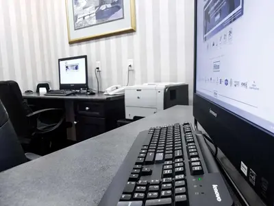 a laptop computer sitting on top of a desk at Hampton Inn & Suites by Hilton Edmonton International Airport in Leduc