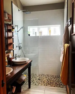 a bathroom with a shower and a sink at Bjørn Holm in Port Renfrew