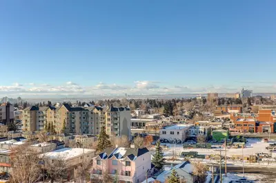 a cityscape of a city with buildings at Marquee on 16th in Calgary
