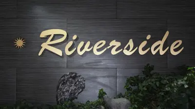 a sign with the word refrigerated on a wall at Riverside Motel in Penticton