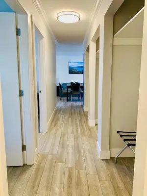 an empty hallway with a dining room and a table at Traveler's Motel Penticton in Penticton