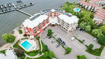 an aerial view of a building with a marina at Manteo at Eldorado Resort in Kelowna