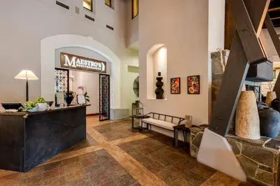 a lobby of a museum with a counter at Manteo at Eldorado Resort in Kelowna