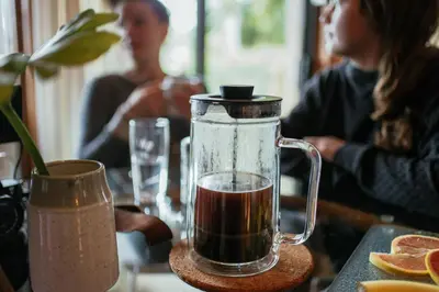 a drink in a blender sitting on a table at The Shoreline Tofino in Tofino