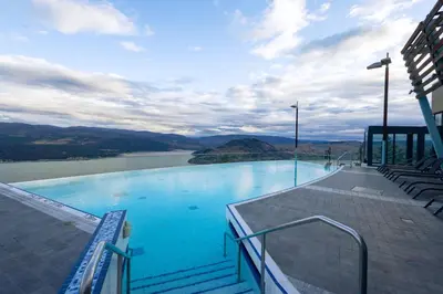 a large swimming pool on top of a building at Sparkling Hill Resort and Spa - Adults-Only Resort in Vernon