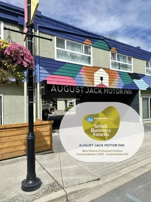 a building with a sign that reads august jackmont at August Jack Inn in Squamish