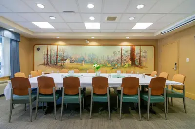 a conference room with a large table and chairs at Best Western PLUS Chemainus Inn in Chemainus