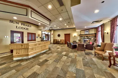 a lobby of a sun peaks lodge with a waiting room at Sun Peaks Lodge in Sun Peaks