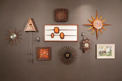 a wall with many different types of clocks on it at Hotel Zed Tofino in Tofino
