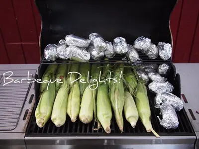 a bunch of green vegetables on a grill at West Coast Motel on the Harbour in Ucluelet